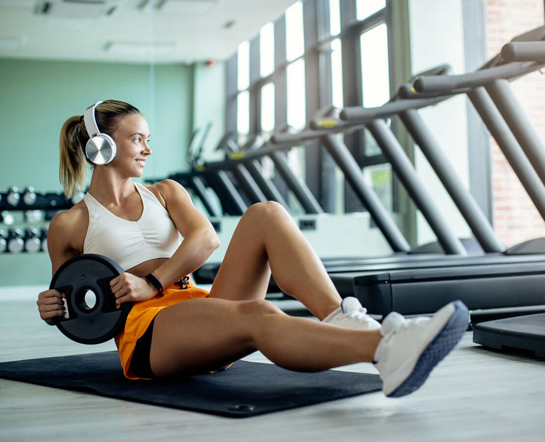 Smiling Through the Sweat: A Moment of Strength and Joy
